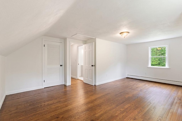 133 Jean Dr, Seekonk, MA 02771 - additional living space with wood finished floors, baseboards, a baseboard heating unit, and vaulted ceiling