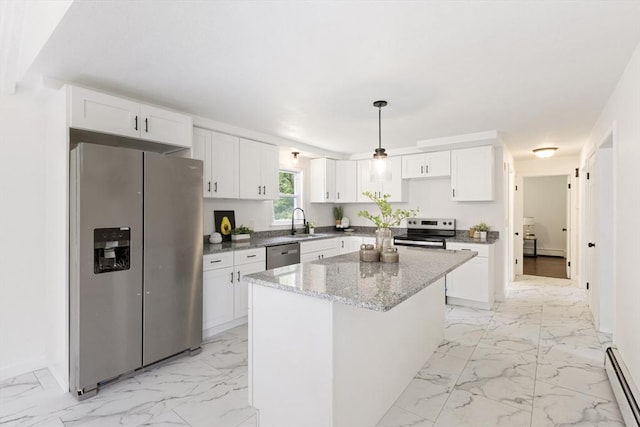 133 Jean Dr, Seekonk, MA 02771 - kitchen featuring appliances with stainless steel finishes, light marble finish floors, a baseboard heating unit, and white cabinetry