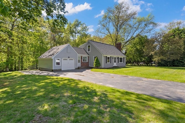 133 Jean Dr, Seekonk, MA 02771 - view of front of home with a garage, asphalt driveway, a front yard, a chimney, and brick siding