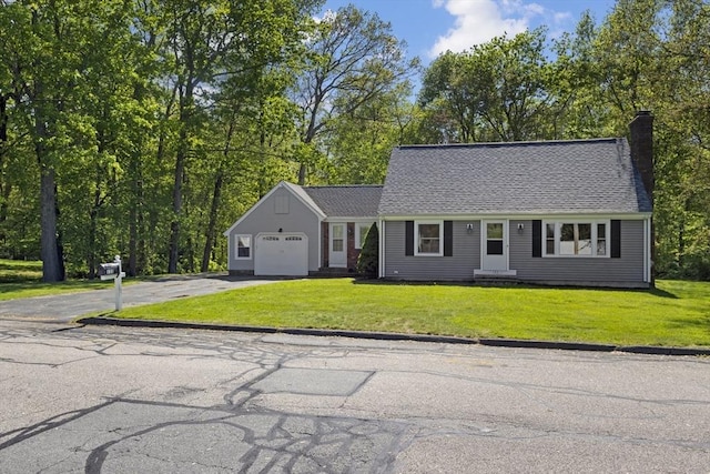 133 Jean Dr, Seekonk, MA 02771 - view of front of property featuring asphalt driveway, a garage, a chimney, and a front yard