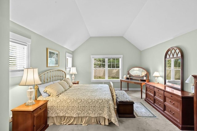 33 Inkberry Ln, Plymouth, MA 02360 - bedroom with multiple windows, light carpet, vaulted ceiling, and baseboards