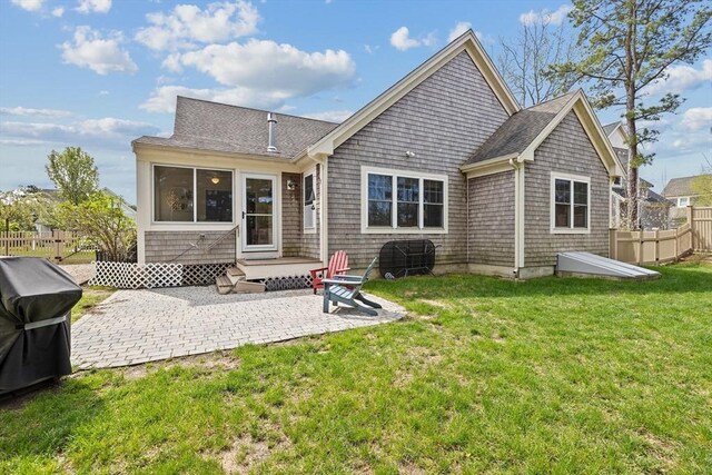 33 Inkberry Ln, Plymouth, MA 02360 - back of house with a patio area and a shingled roof