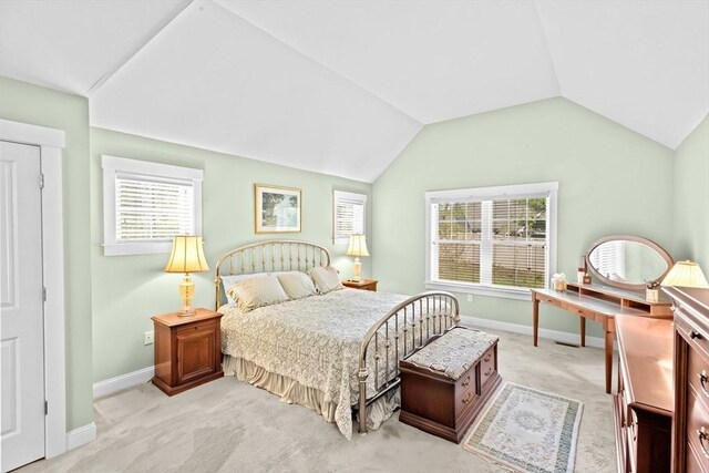 33 Inkberry Ln, Plymouth, MA 02360 - bedroom featuring baseboards, light colored carpet, vaulted ceiling, and multiple windows
