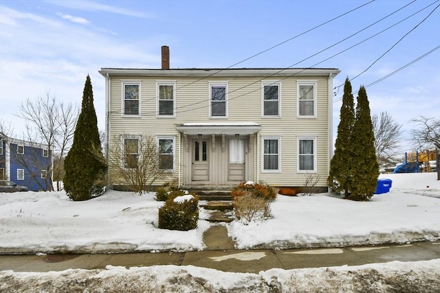view of front of property featuring a chimney