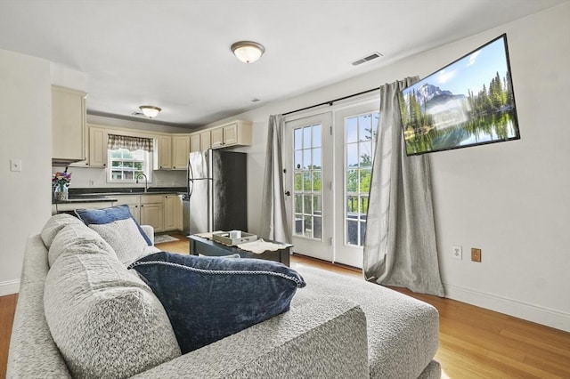226-236 River St Unit 5, Haverhill, MA 01832 - living room with light wood finished floors and baseboards