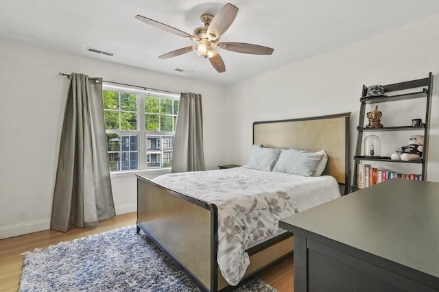 226-236 River St Unit 5, Haverhill, MA 01832 - bedroom with baseboards, wood finished floors, and a ceiling fan