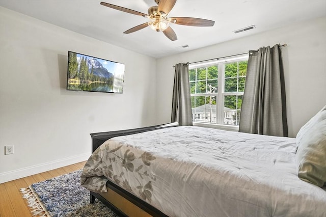 226-236 River St Unit 5, Haverhill, MA 01832 - bedroom featuring baseboards, wood-type flooring, and a ceiling fan