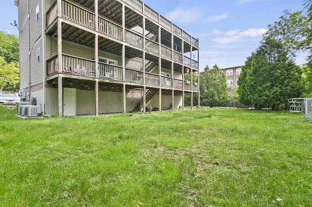226-236 River St Unit 5, Haverhill, MA 01832 - back of house with a deck and central AC unit