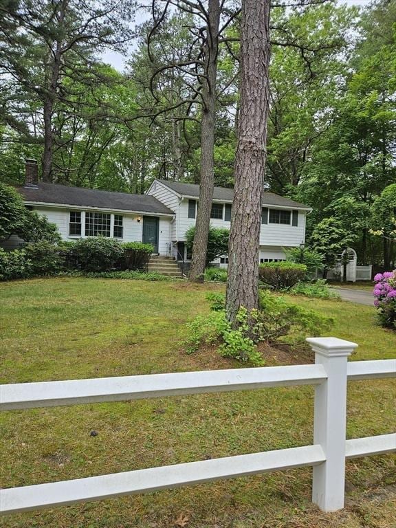 59 Tanbark Rd, Sudbury, MA 01776 - split level home with a chimney