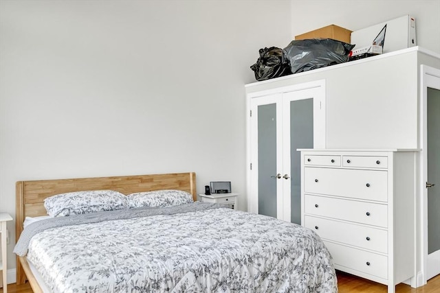 bedroom featuring light hardwood / wood-style floors