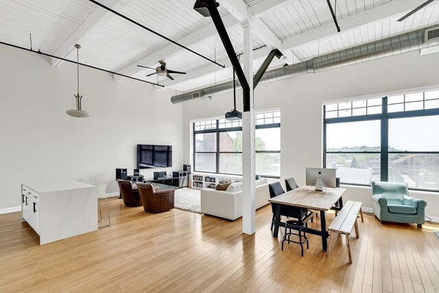 kitchen featuring sink, white cabinets, stainless steel appliances, and light hardwood / wood-style floors