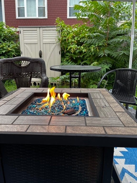 exterior space with a fire pit