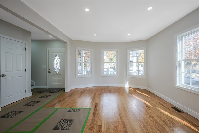 foyer with light hardwood / wood-style flooring