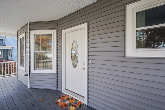 doorway to property featuring a porch