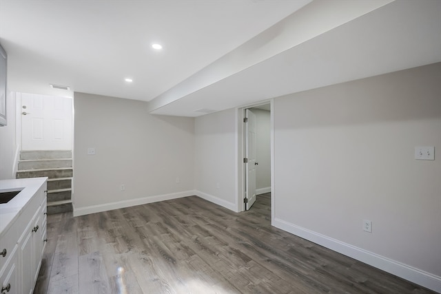 basement featuring light wood-type flooring