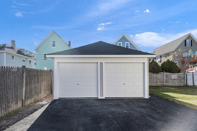 garage with a lawn