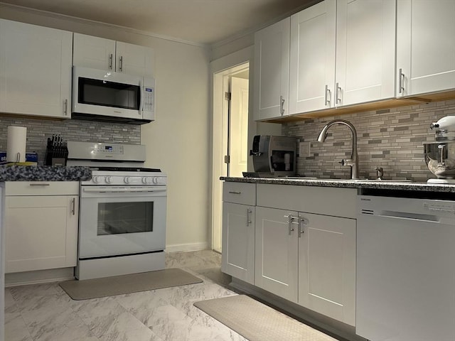 44-46 Spring St, West Springfield, MA 01089 - kitchen featuring white appliances, tasteful backsplash, white cabinetry, and crown molding