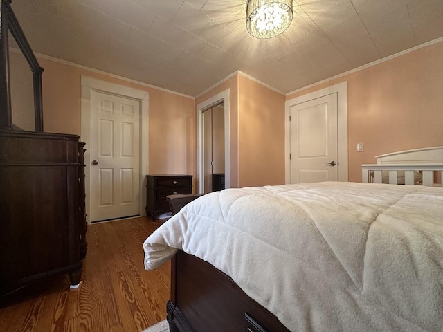 44-46 Spring St, West Springfield, MA 01089 - bedroom featuring wood finished floors and crown molding