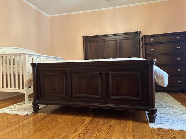 44-46 Spring St, West Springfield, MA 01089 - bedroom featuring wood finished floors and crown molding