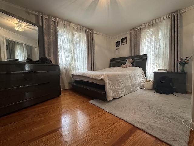 44-46 Spring St, West Springfield, MA 01089 - bedroom with wood finished floors and ornamental molding