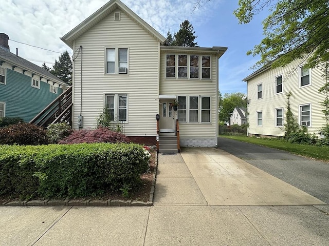 44-46 Spring St, West Springfield, MA 01089 - traditional home featuring entry steps and cooling unit