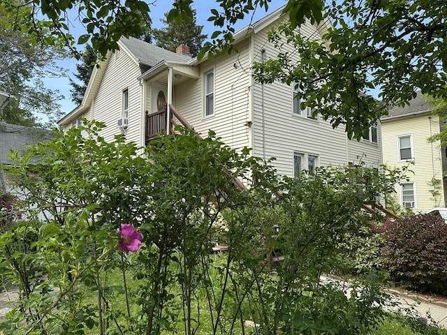 44-46 Spring St, West Springfield, MA 01089 - view of property exterior featuring a chimney