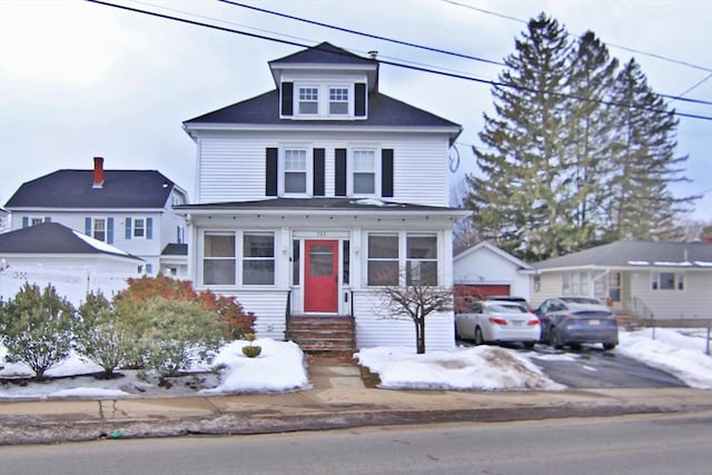 traditional style home featuring entry steps