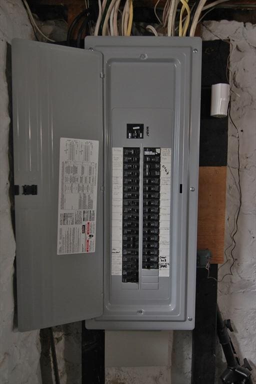 utility room featuring electric panel