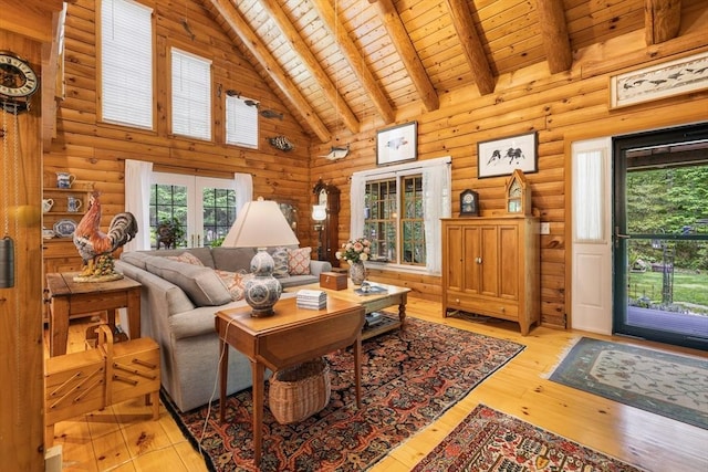 7 Rileys Way, Dartmouth, MA 02747 - living room with wood ceiling with exposed beams, light wood-type flooring, high vaulted ceiling, and rustic walls