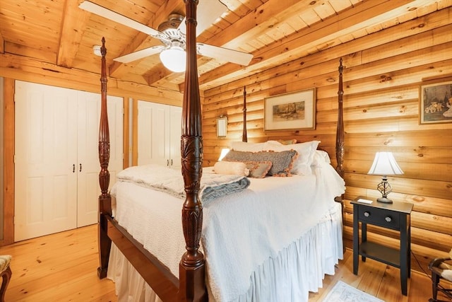 7 Rileys Way, Dartmouth, MA 02747 - bedroom with wood ceiling with exposed beams, light wood-style flooring, and wooden walls