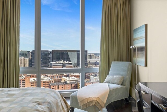 bedroom featuring a view of city