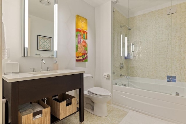 full bath with toilet, shower / tub combination, vanity, and tile patterned floors