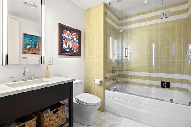full bath featuring toilet,  shower combination, tile patterned floors, and vanity