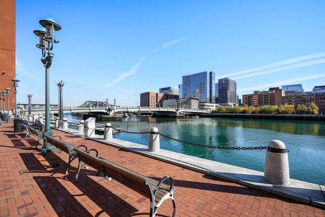 dock area with a water view and a city view