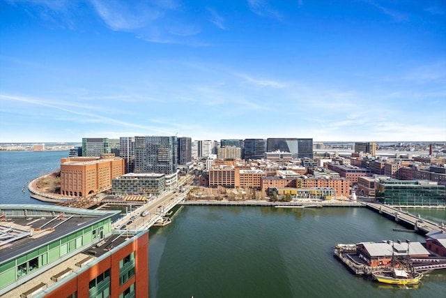 view of urban area with a nearby body of water
