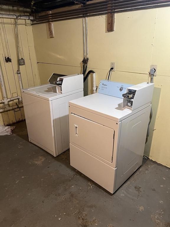 laundry room with washer and dryer