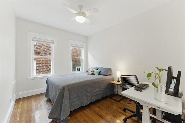 200 Winchester St Unit 1, Brookline, MA 02446 - bedroom featuring wood finished floors, baseboards, an office area, and ceiling fan