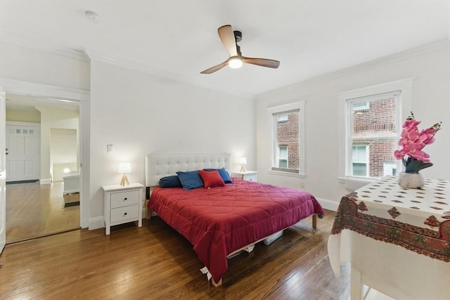 200 Winchester St Unit 1, Brookline, MA 02446 - bedroom with wood finished floors, crown molding, baseboards, and ceiling fan