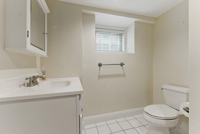 200 Winchester St Unit 1, Brookline, MA 02446 - bathroom with toilet, vanity, baseboards, and tile patterned flooring