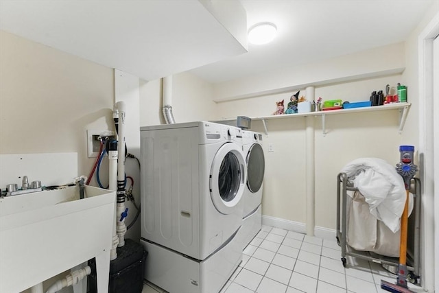 200 Winchester St Unit 1, Brookline, MA 02446 - laundry area featuring washing machine and clothes dryer and light tile patterned floors