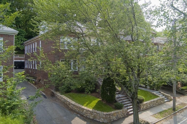 200 Winchester St Unit 1, Brookline, MA 02446 - view of front facade with brick siding and stairway