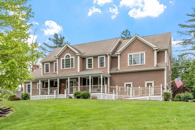 28 Sandy Ridge Rd, Sterling, MA 01564 - view of front of home with a front yard, a chimney, and a porch