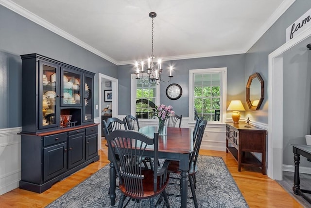 28 Sandy Ridge Rd, Sterling, MA 01564 - dining space featuring a chandelier, light wood-type flooring, a wainscoted wall, and ornamental molding