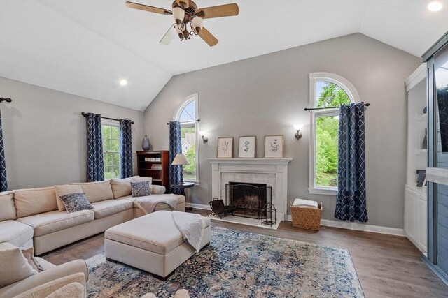 28 Sandy Ridge Rd, Sterling, MA 01564 - living area featuring vaulted ceiling, a fireplace, ceiling fan, wood finished floors, and recessed lighting