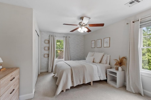 28 Sandy Ridge Rd, Sterling, MA 01564 - bedroom featuring brick wall, light carpet, ceiling fan, and baseboards