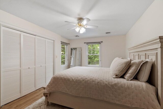 28 Sandy Ridge Rd, Sterling, MA 01564 - bedroom with light wood-type flooring, a closet, and a ceiling fan