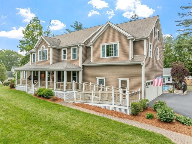 28 Sandy Ridge Rd, Sterling, MA 01564 - view of front facade with asphalt driveway, a porch, a front yard, a garage, and roof with shingles