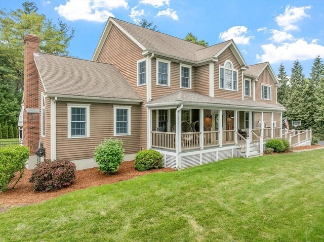 28 Sandy Ridge Rd, Sterling, MA 01564 - view of front of property with a chimney, covered porch, a front lawn, and a shingled roof