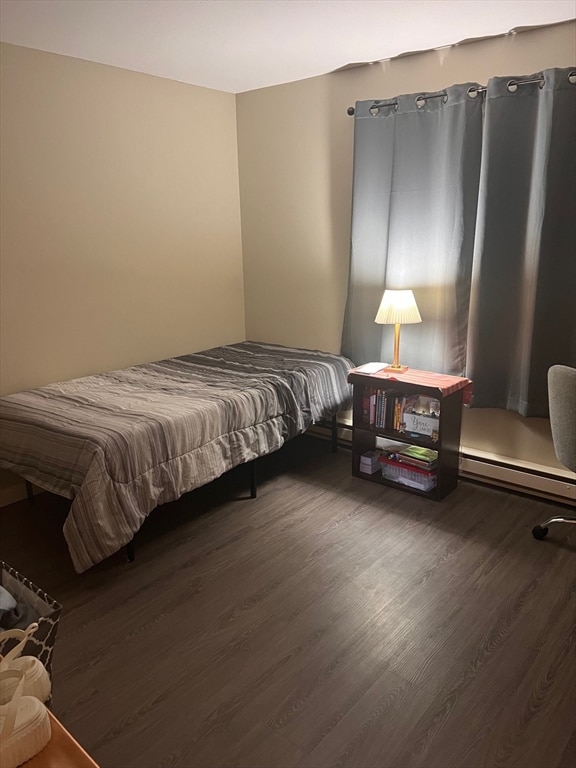 bedroom featuring dark hardwood / wood-style floors