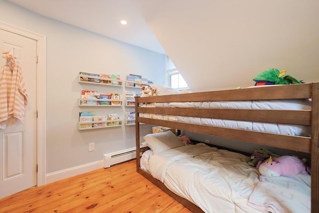 43 Thompson St, Maynard, MA 01754 - bedroom featuring light wood-style flooring, a baseboard radiator, and recessed lighting